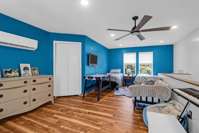 1468 N Relyea Ave, Charleston, SC 29412 - bedroom with a wall unit AC, light wood finished floors, a closet, ceiling fan, and recessed lighting
