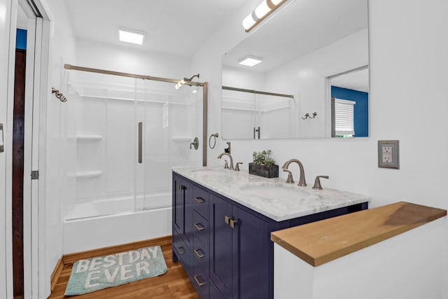 1468 N Relyea Ave, Charleston, SC 29412 - bathroom featuring wood finished floors, double vanity, and bathing tub / shower combination