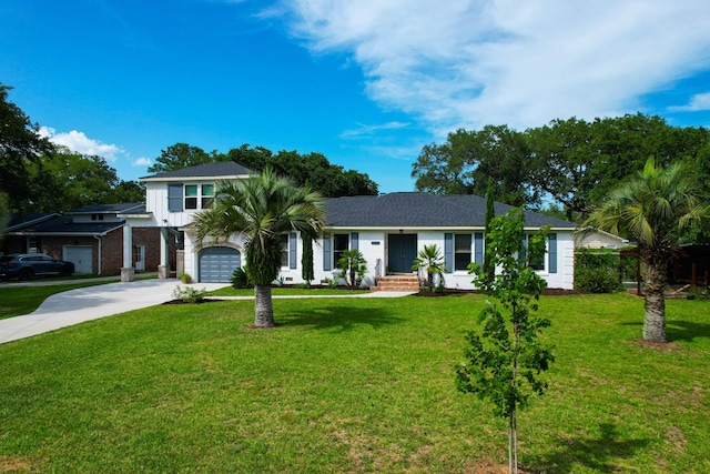 1468 N Relyea Ave, Charleston, SC 29412 - view of front of house featuring concrete driveway, a garage, and a front lawn