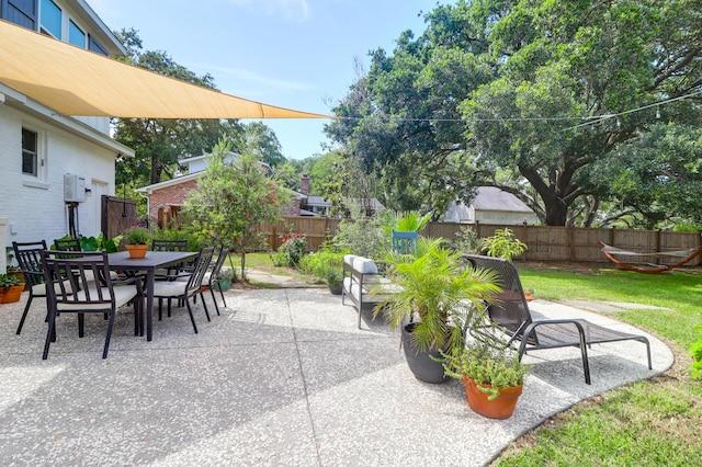 1468 N Relyea Ave, Charleston, SC 29412 - fenced backyard with a patio area and outdoor dining space