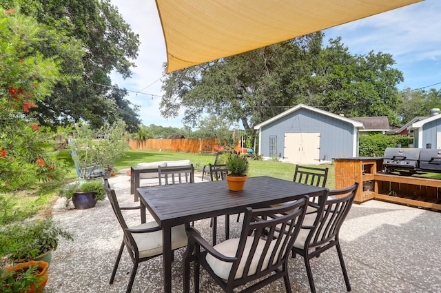 1468 N Relyea Ave, Charleston, SC 29412 - view of patio with outdoor dining area, an outdoor structure, and area for grilling