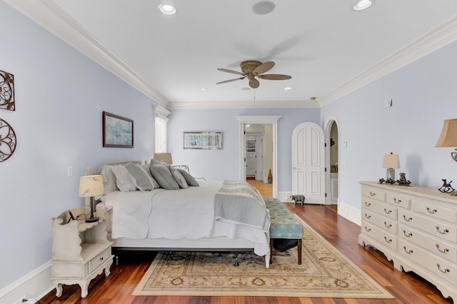 bedroom with ceiling fan, hardwood / wood-style flooring, and ornamental molding