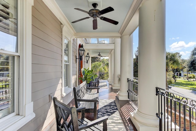 exterior space featuring ceiling fan and a porch