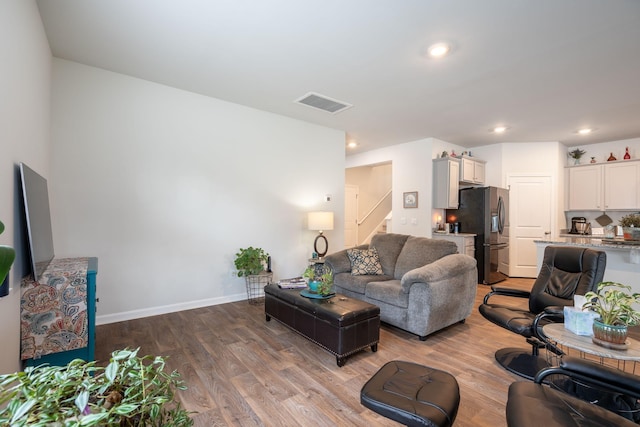 127 William Clark Blvd, Santee, SC 29142 - living area with stairs, light wood-type flooring, baseboards, and recessed lighting
