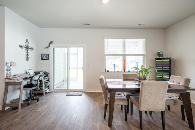 dining room featuring dark hardwood / wood-style floors