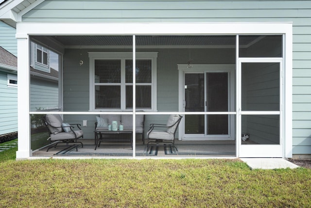 rear view of house with a yard and a patio area