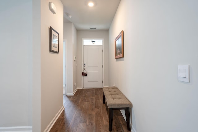 hall with dark hardwood / wood-style floors