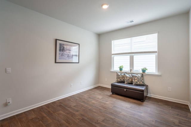 spare room featuring dark hardwood / wood-style floors