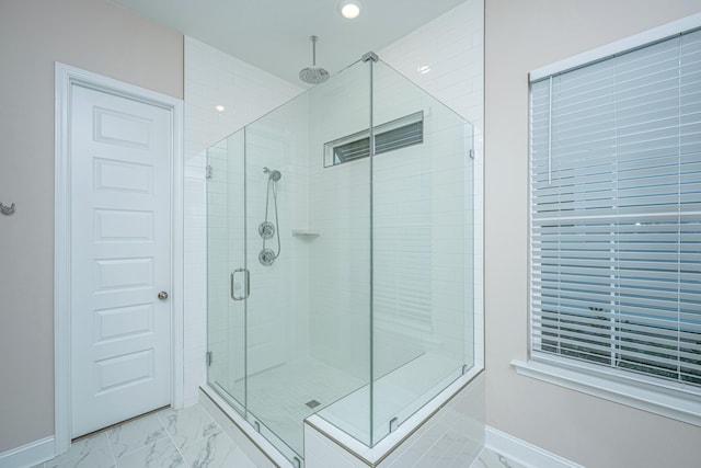 bathroom with an enclosed shower