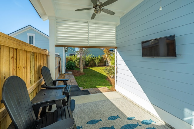 view of patio with ceiling fan