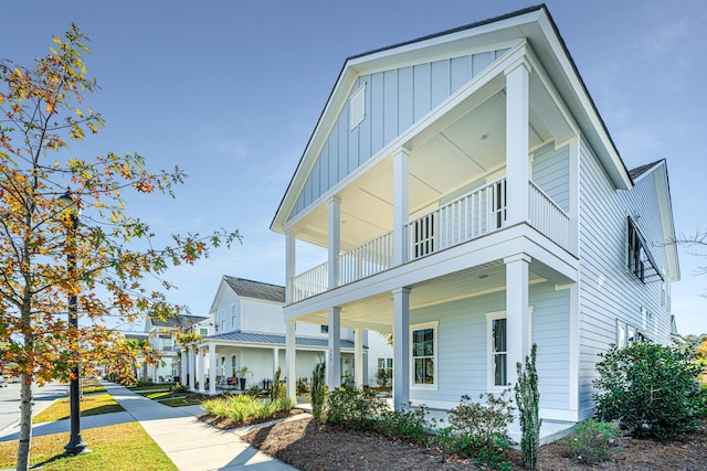 view of front of home with a balcony