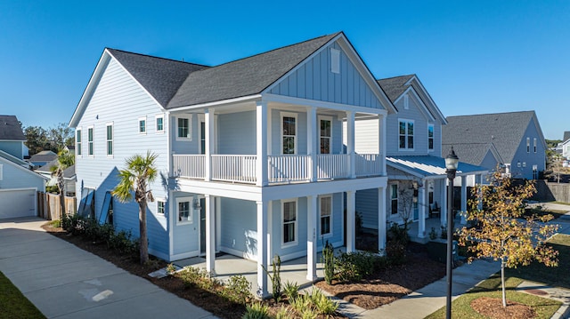 view of front of home featuring a balcony and a porch