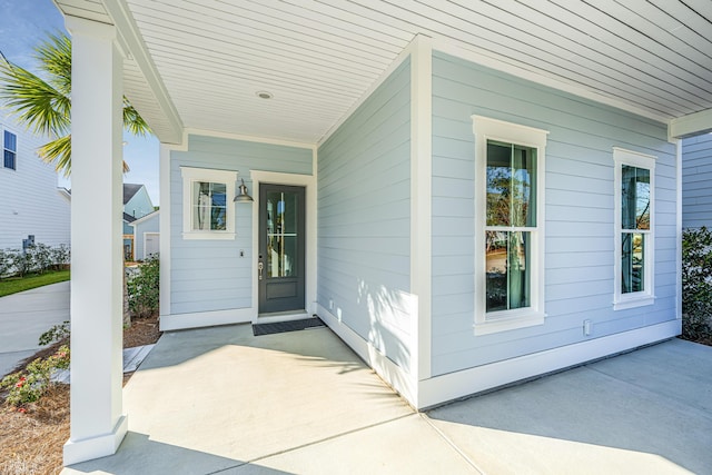 property entrance featuring covered porch