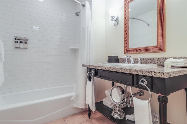 bathroom with shower / bath combo, tile floors, and vanity