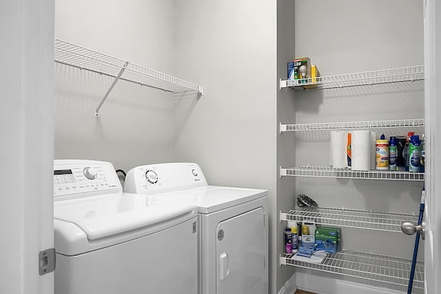 laundry area with independent washer and dryer and laundry area