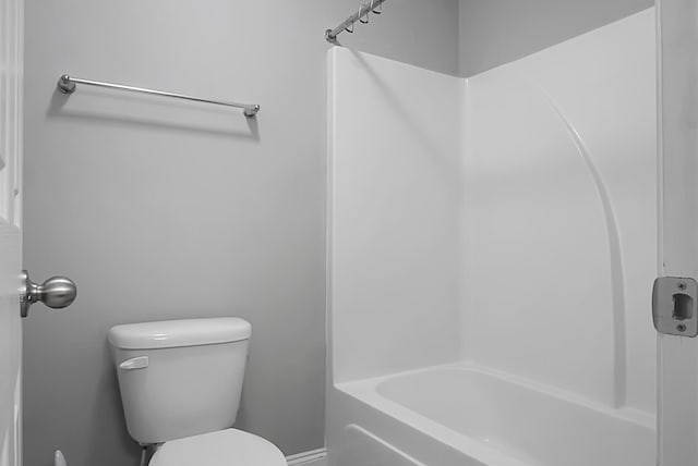 full bathroom featuring toilet