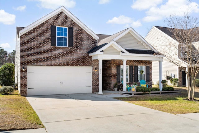 view of front of house featuring brick siding, covered porch, an attached garage, and concrete driveway