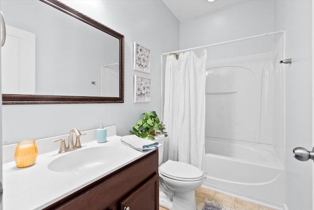 full bathroom with tile patterned floors, toilet, vanity, and shower / bath combination with curtain