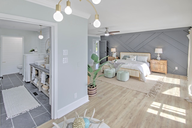 tiled bedroom featuring crown molding and ceiling fan