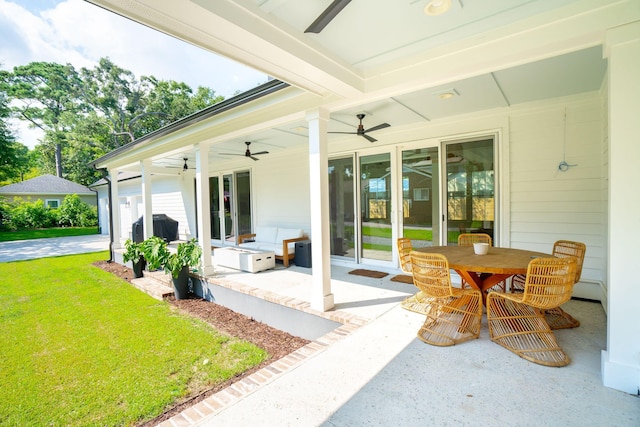 view of patio with grilling area and ceiling fan