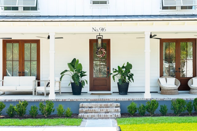 doorway to property with french doors and a porch