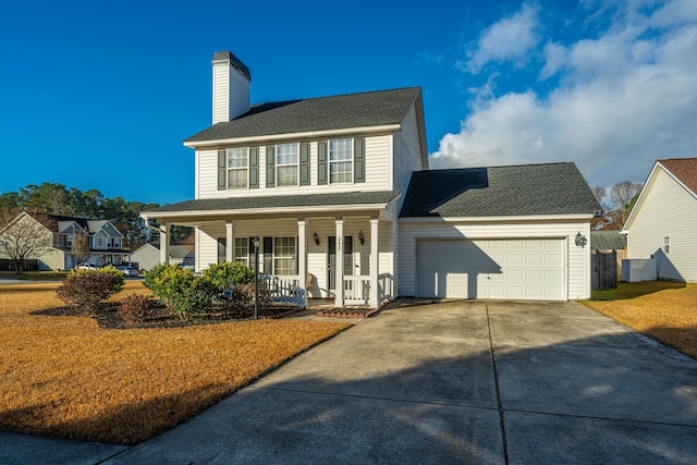 colonial-style house with a garage and a porch