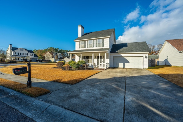 colonial inspired home with a porch and a garage