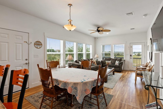 31 W 9th St, Folly Beach, SC 29439 - dining room featuring a ceiling fan and light wood-style floors