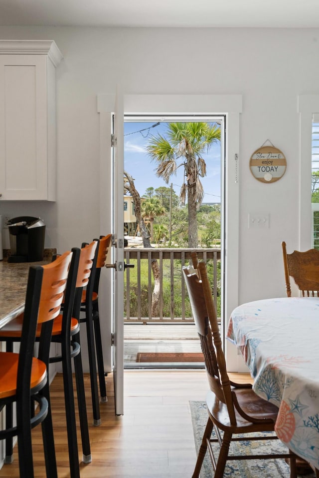 31 W 9th St, Folly Beach, SC 29439 - dining area with light wood-style flooring