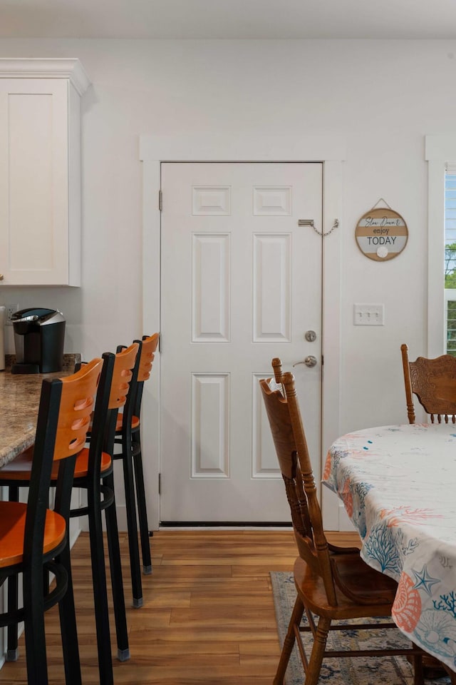 31 W 9th St, Folly Beach, SC 29439 - dining space featuring wood finished floors