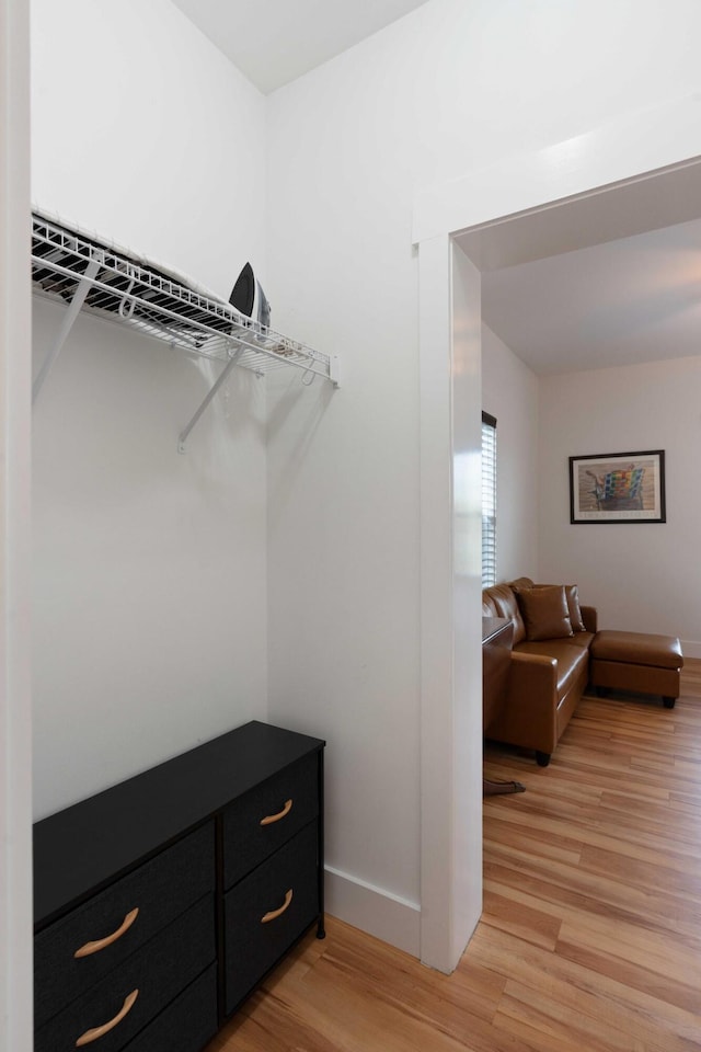 31 W 9th St, Folly Beach, SC 29439 - walk in closet with light wood finished floors