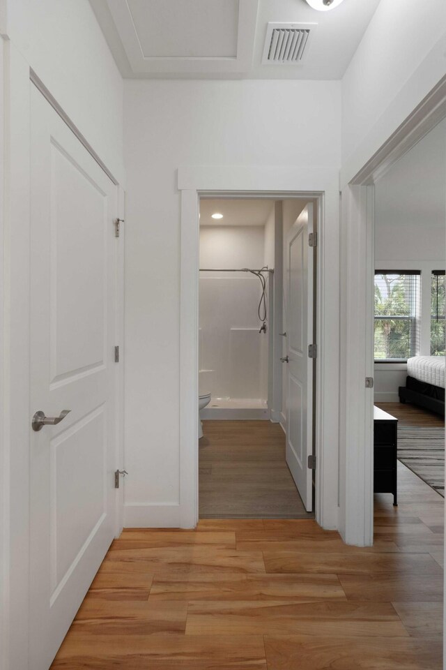 31 W 9th St, Folly Beach, SC 29439 - hallway featuring light wood-style flooring