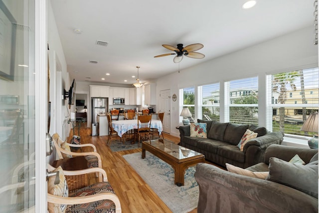 31 W 9th St, Folly Beach, SC 29439 - living area featuring a ceiling fan, light wood-type flooring, and recessed lighting