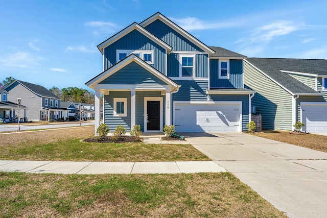 view of front facade featuring board and batten siding, a residential view, concrete driveway, and an attached garage