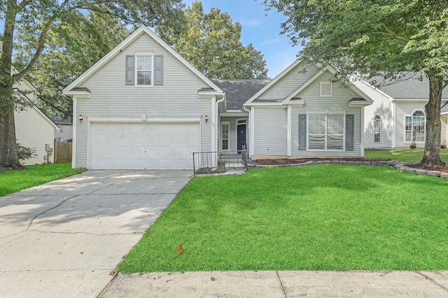 view of front property with a garage and a front lawn