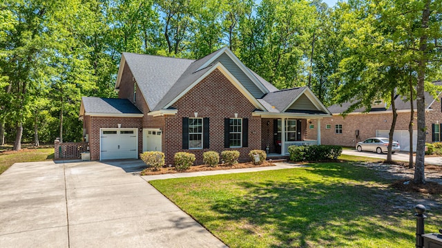 5442 Clearview Dr, North Charleston, SC 29420 - traditional home featuring an attached garage, a front lawn, brick siding, and a porch