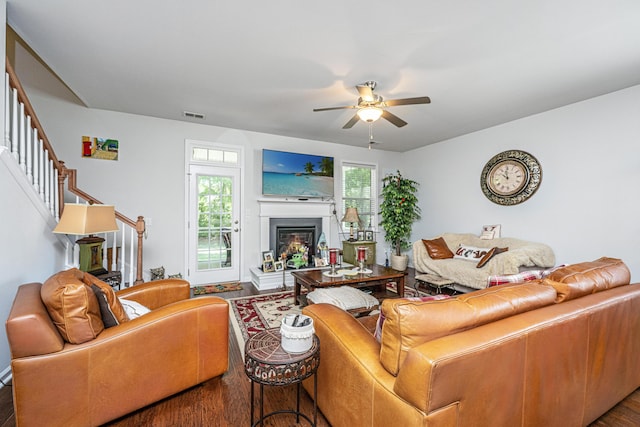 5442 Clearview Dr, North Charleston, SC 29420 - living area featuring wood finished floors, stairs, ceiling fan, and plenty of natural light