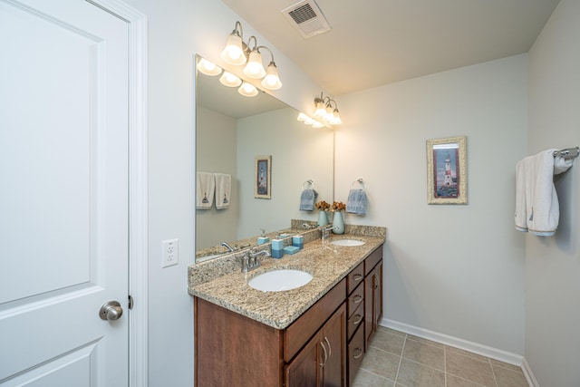 5442 Clearview Dr, North Charleston, SC 29420 - full bath featuring double vanity, baseboards, and tile patterned floors