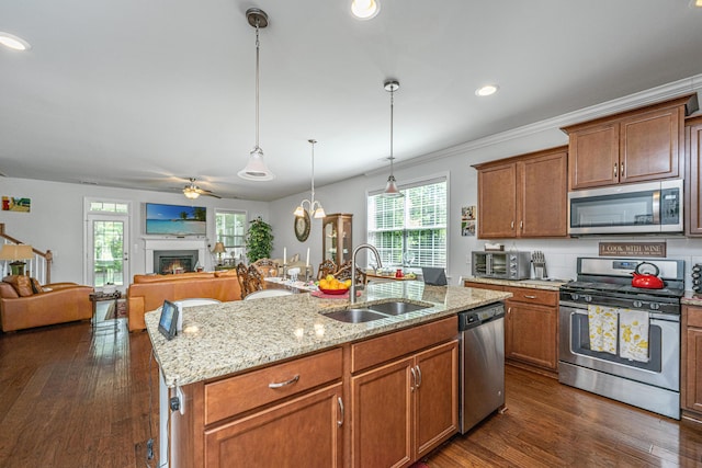 5442 Clearview Dr, North Charleston, SC 29420 - kitchen featuring appliances with stainless steel finishes, a sink, plenty of natural light, open floor plan, and recessed lighting