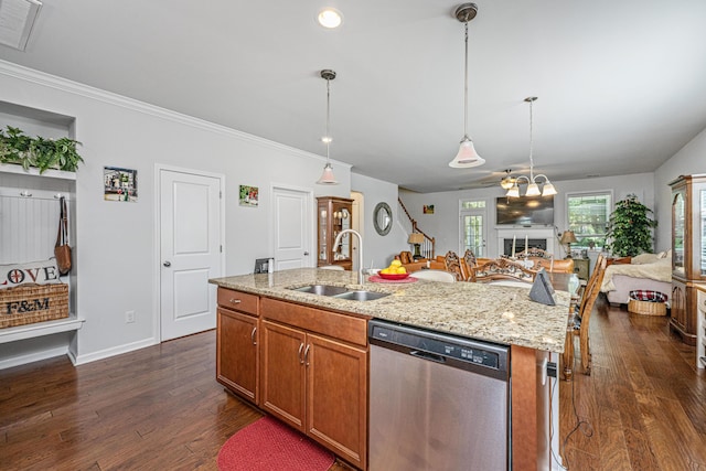5442 Clearview Dr, North Charleston, SC 29420 - kitchen with dishwasher, a sink, open floor plan, brown cabinets, and pendant lighting