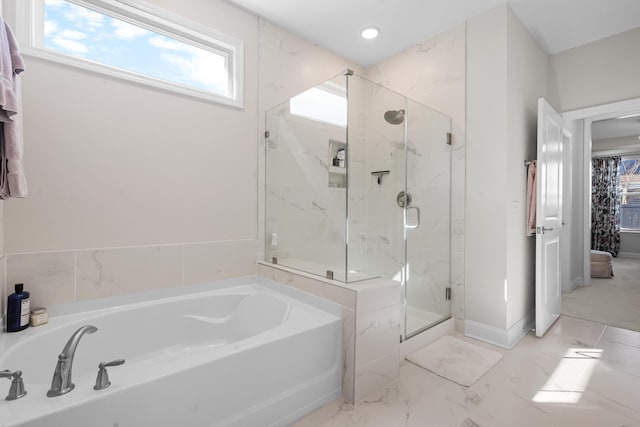 bathroom with independent shower and bath