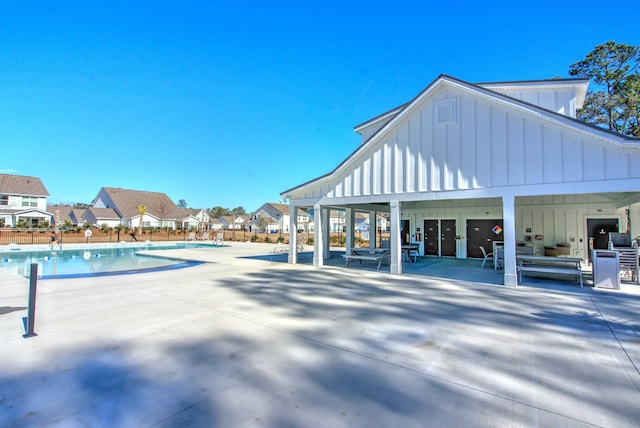 view of swimming pool featuring a patio area