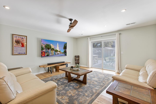 living room with recessed lighting, wood finished floors, a ceiling fan, baseboards, and visible vents