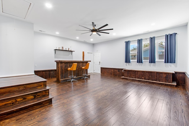 office area featuring attic access, a ceiling fan, hardwood / wood-style flooring, a bar, and recessed lighting