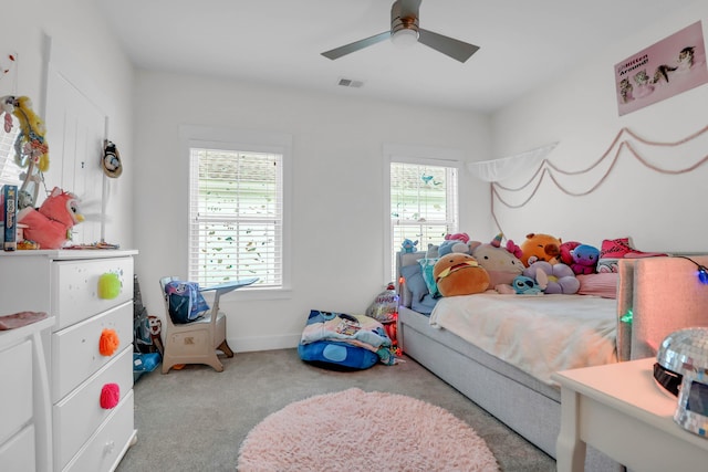 bedroom with carpet floors, baseboards, and ceiling fan