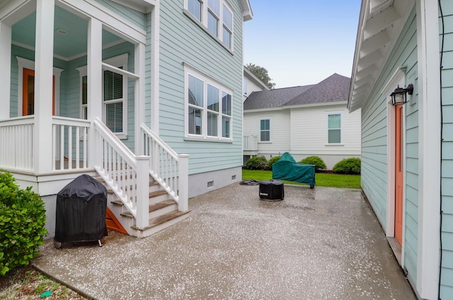 view of patio / terrace with a grill and a fire pit