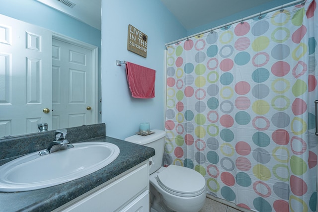 bathroom featuring vanity, toilet, and a shower with curtain