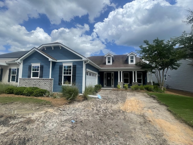 118 Magnolia House Dr, Summerville, SC 29486 - view of front of home featuring a garage and covered porch