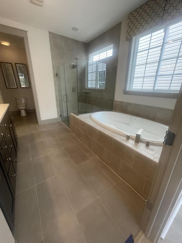 118 Magnolia House Dr, Summerville, SC 29486 - full bathroom featuring tile patterned flooring, vanity, a garden tub, and healthy amount of natural light