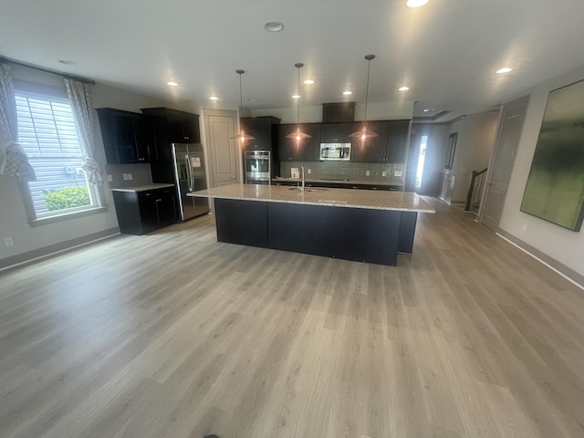 118 Magnolia House Dr, Summerville, SC 29486 - kitchen featuring stainless steel appliances, baseboards, tasteful backsplash, light wood-style floors, and recessed lighting